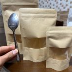 ⁦مجموعة أظرف كرافت تعبئة وتغليف 50 ظرف اغلاق محكم بشريط شفاف، مناسبة لأصحاب المشاريع وحفظ المواد الغذائية⁩ - الصورة ⁦4⁩